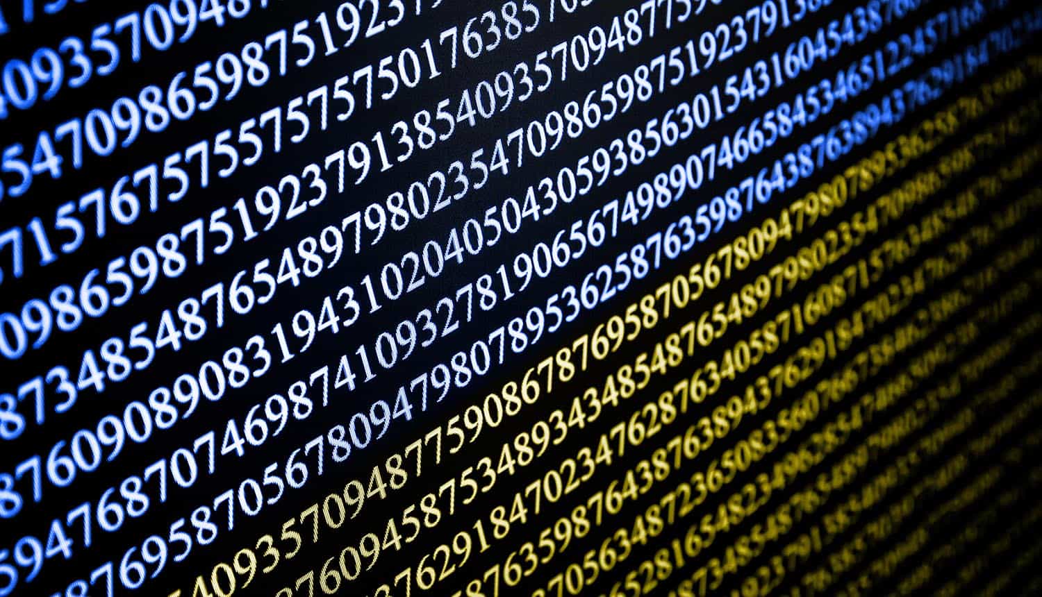 Numbers on computer screen in Ukrainian flag color showing nation-state attacks due to Russia-Ukraine conflict