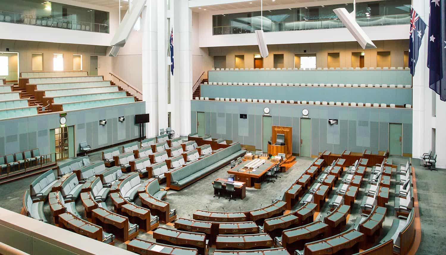 Interior view of the House of Representatives in Parliament House, Canberra, Australia showing penalties for privacy breaches