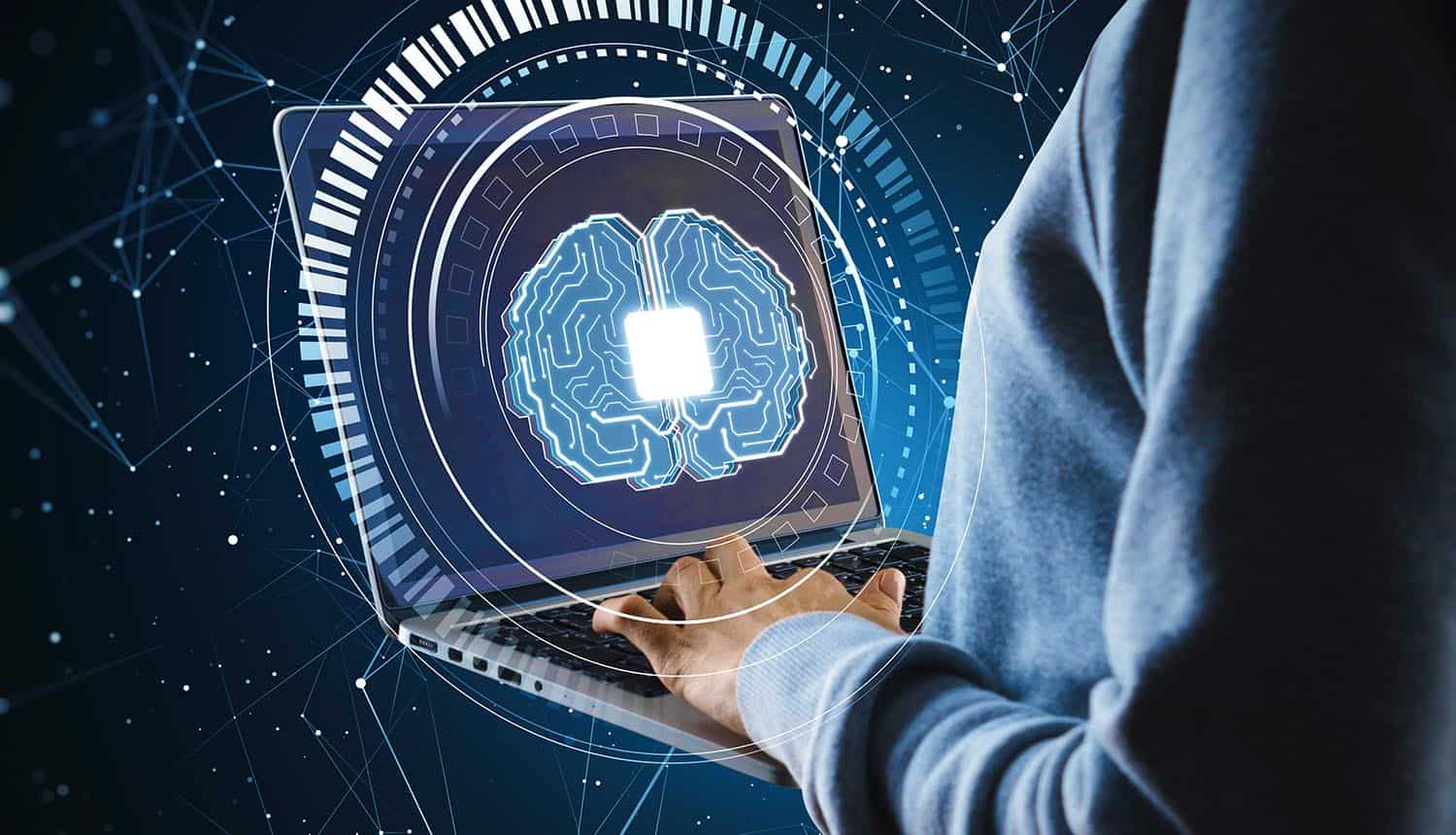 Hacker hands using laptop with glowing brain hologram showing malware from ChatGPT