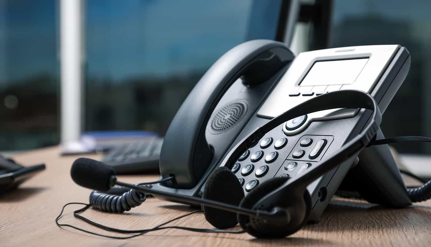 Phone and headset on desk showing supply chain attack