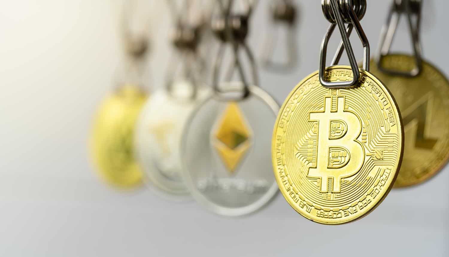 Bitcoin coins hanging on clotheslines showing crypto laundering and Lazarus group