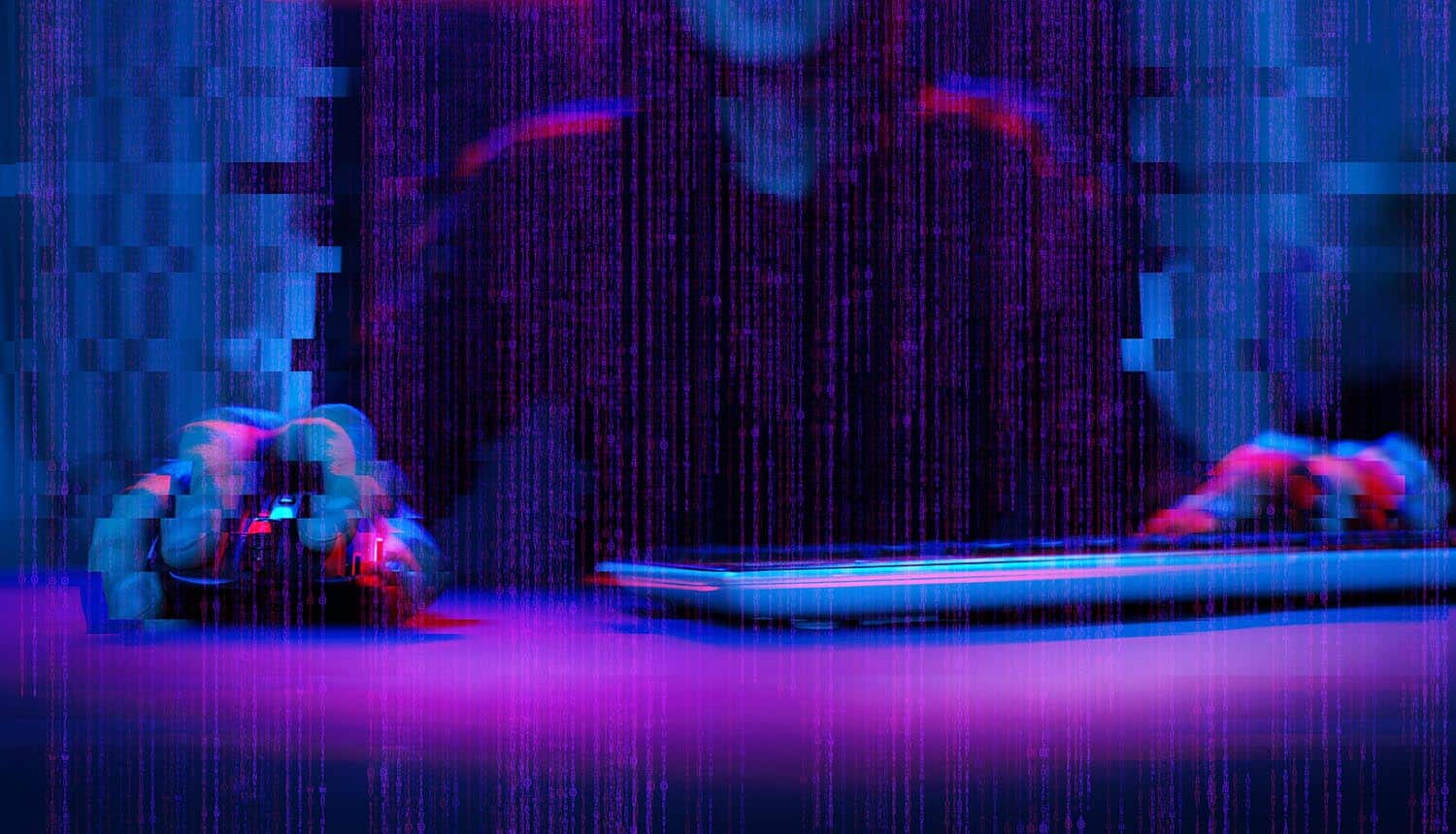 Hacker working with computer in dark room showing data theft