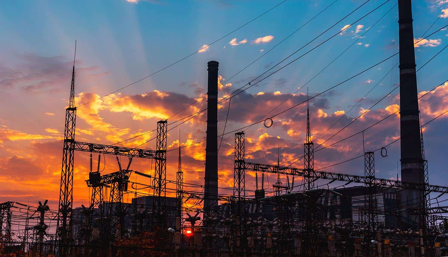 Smoke stacks at power plant showing Chinese hackers in critical infrastructure