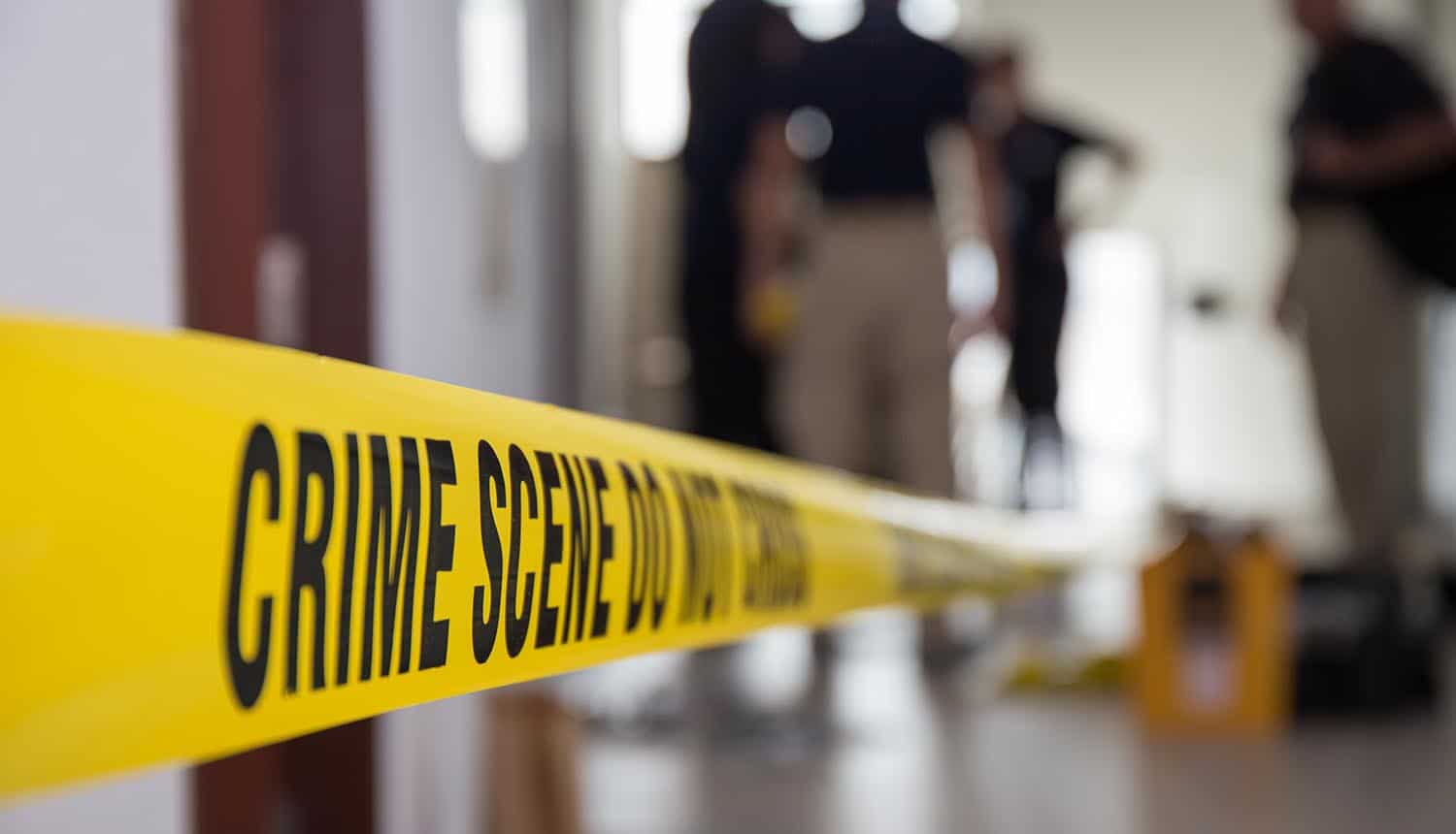 Crime scene tape in building showing cybercrime