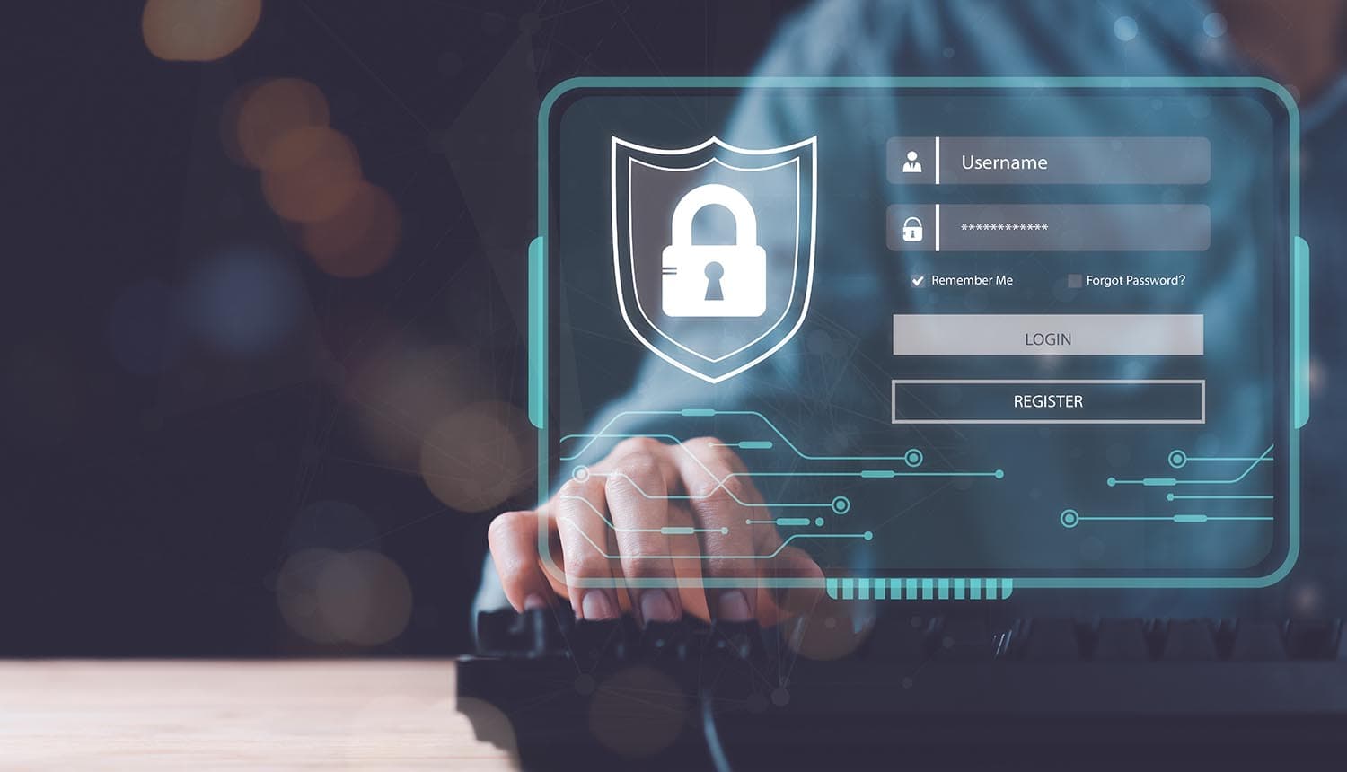 Man at login screen showing MFA bypass and phishing attacks