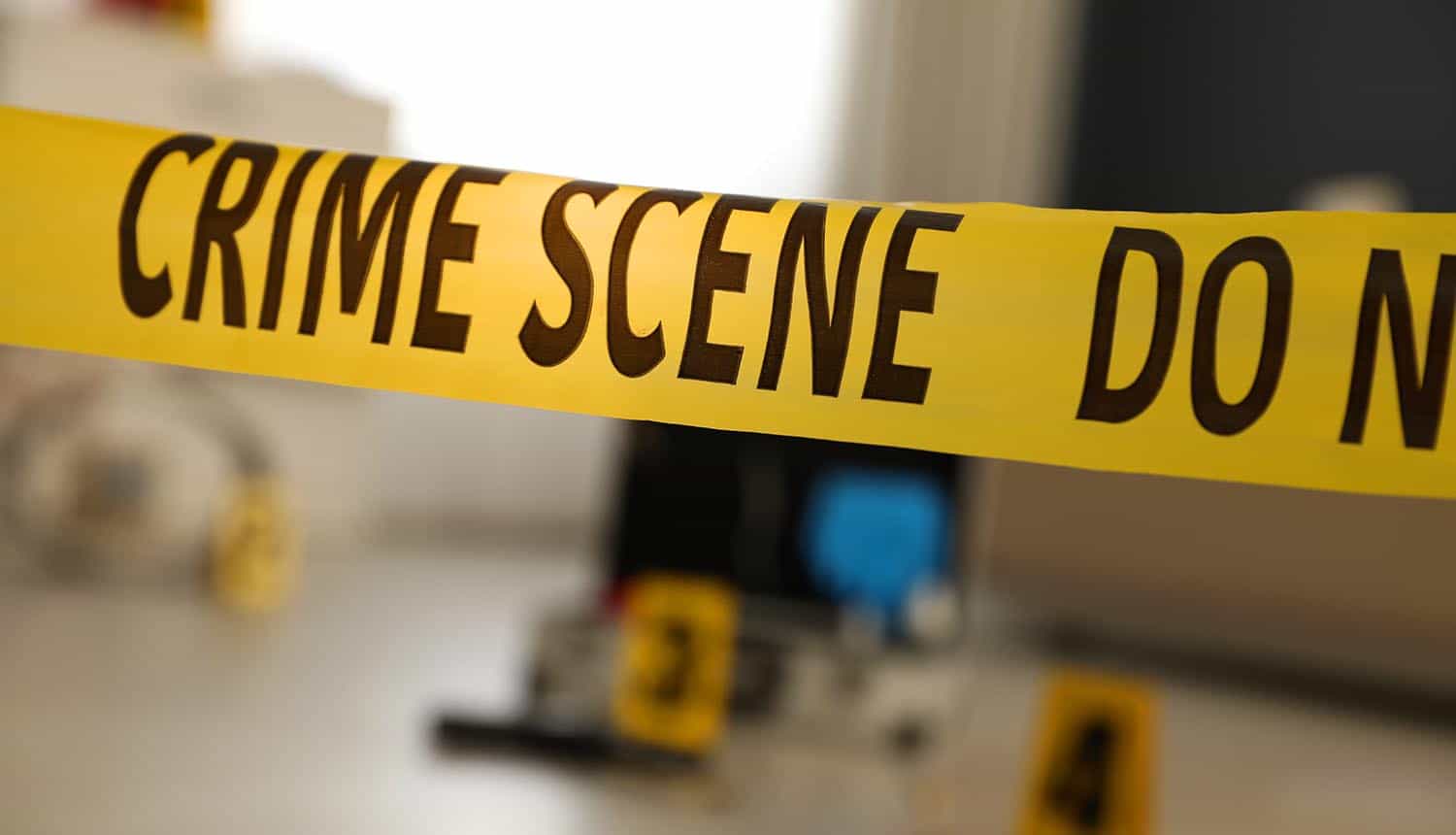 Crime scene with tape showing hacking forum seized