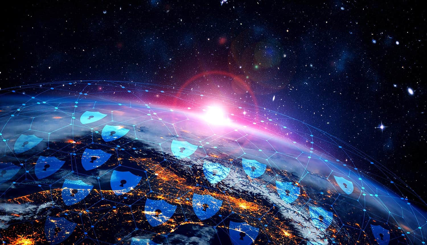 Digital shields over globe showing international cybersecurity strategy