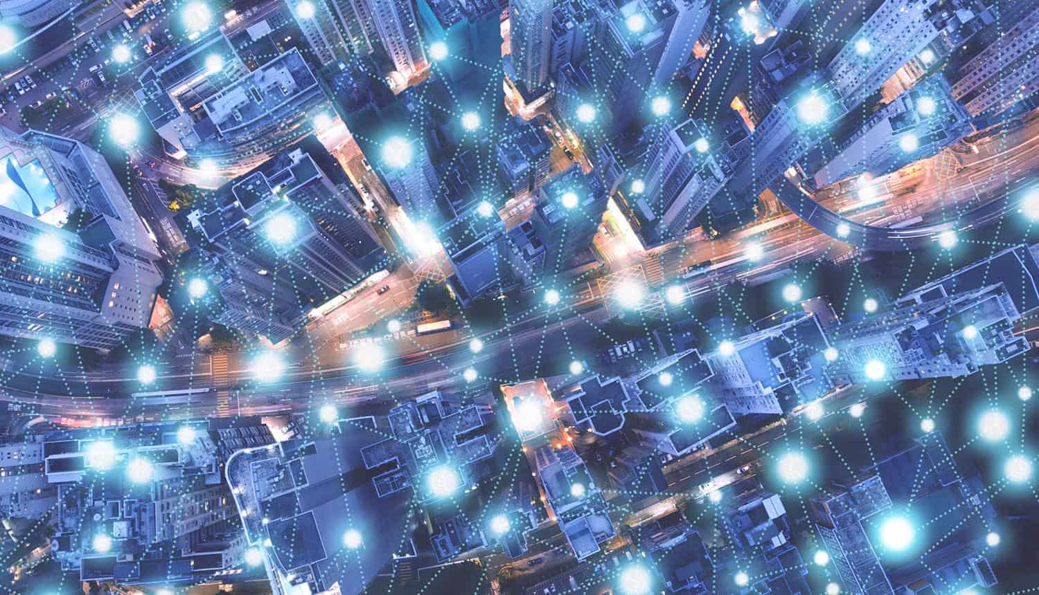 Network links over cityscape showing cyber attack on internet routers