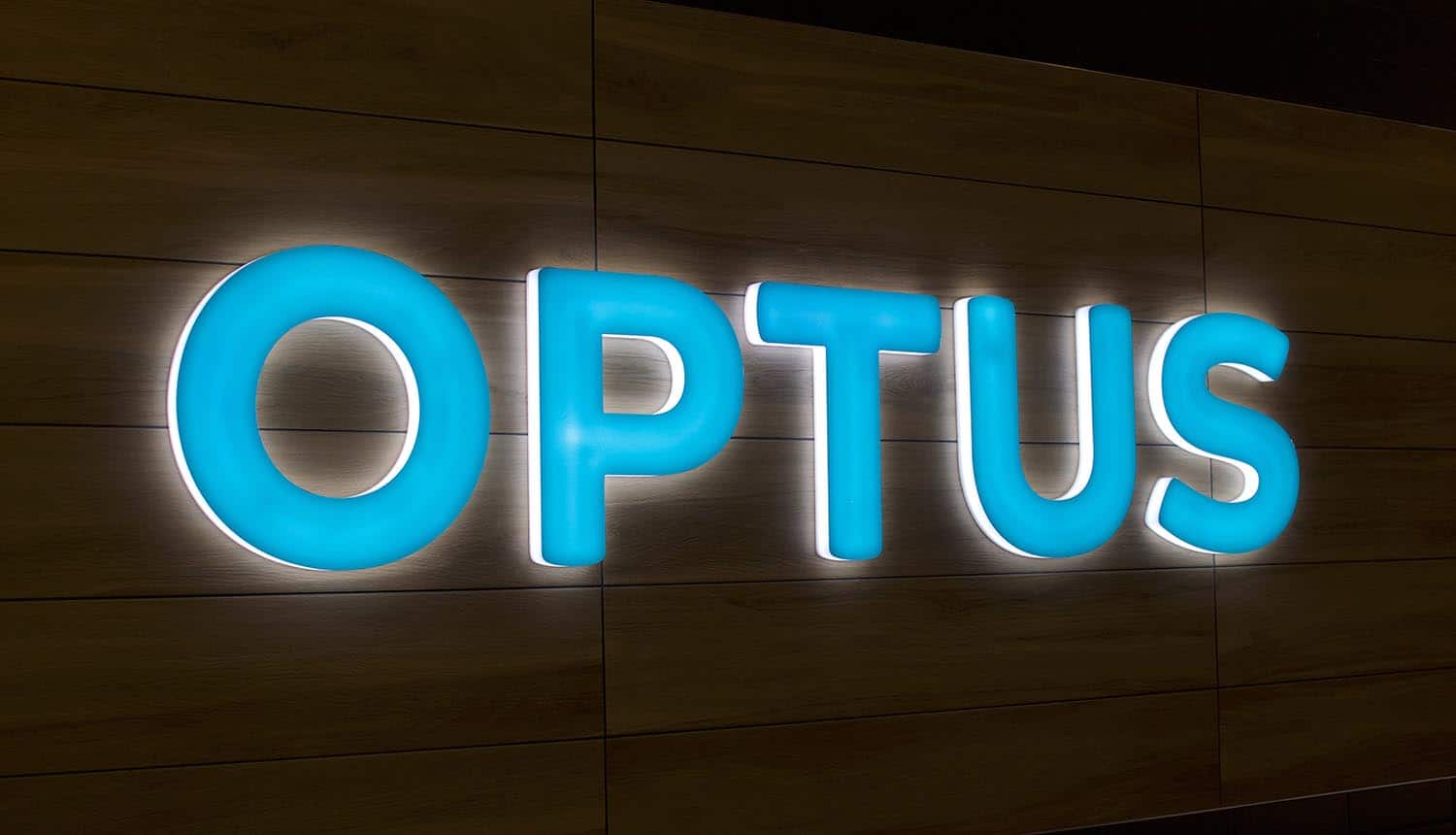 Illuminated Optus sign showing Optus data breach due to coding error in API access control