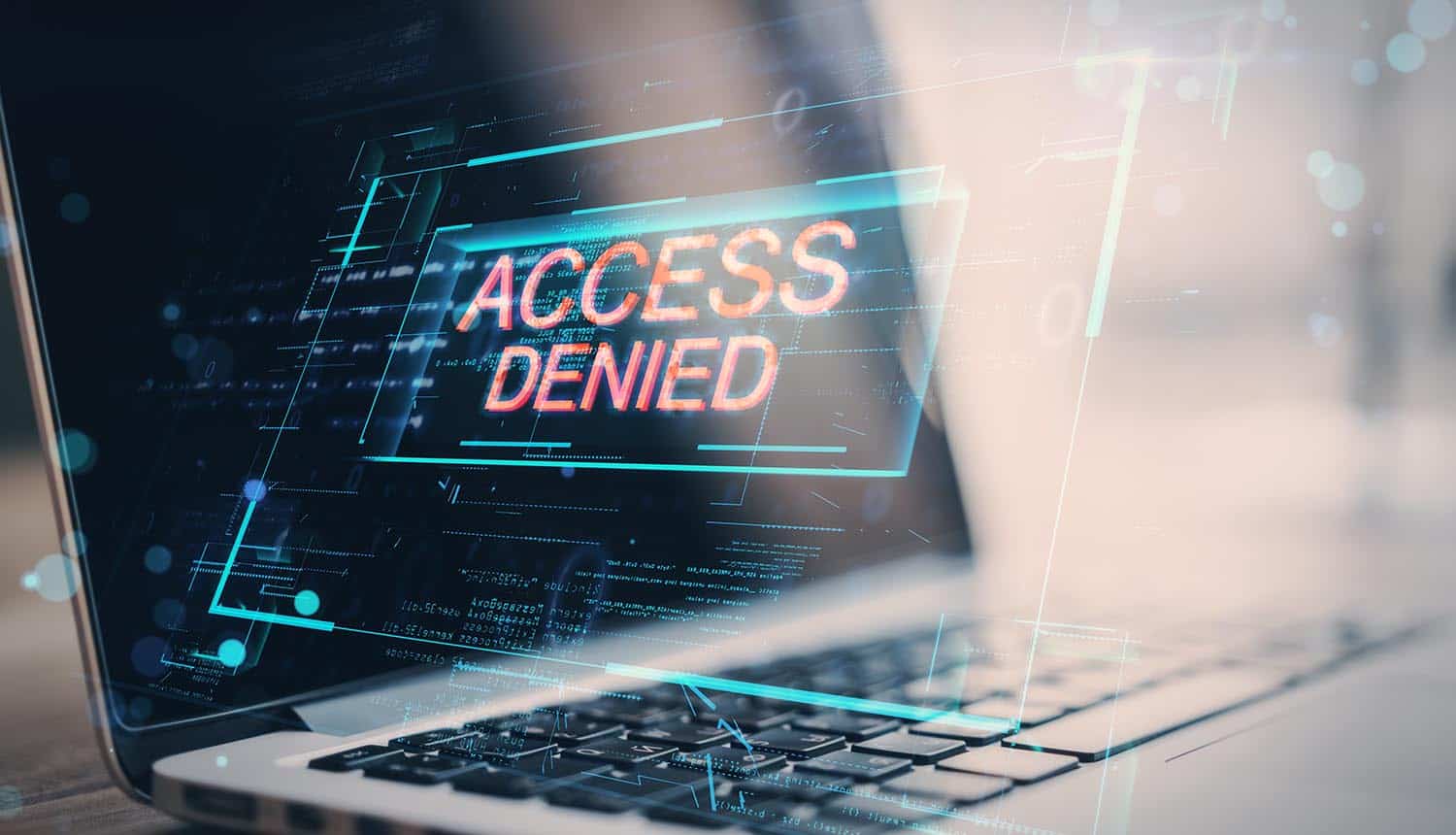 Laptop with denied access hologram showing Teamviewer security breach by Russia APT group