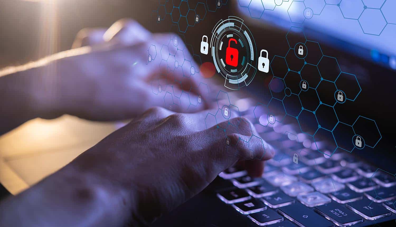 Hands typing on keyboard showing data breach and DDoS attacks on Internet Archive