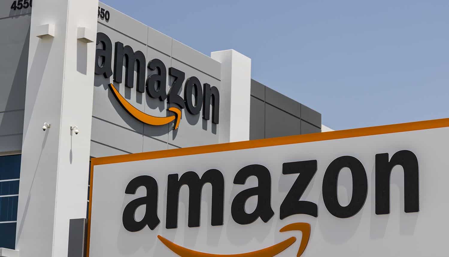 Amazon logo on building showing third party breach of employee data