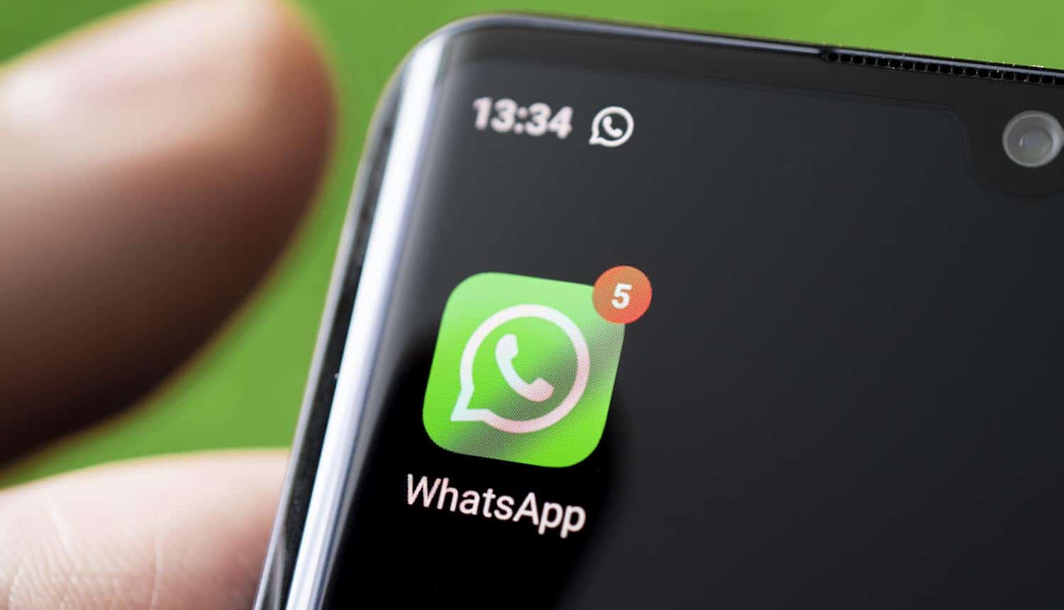 WhatsApp on smartphone showing Paragon spyware