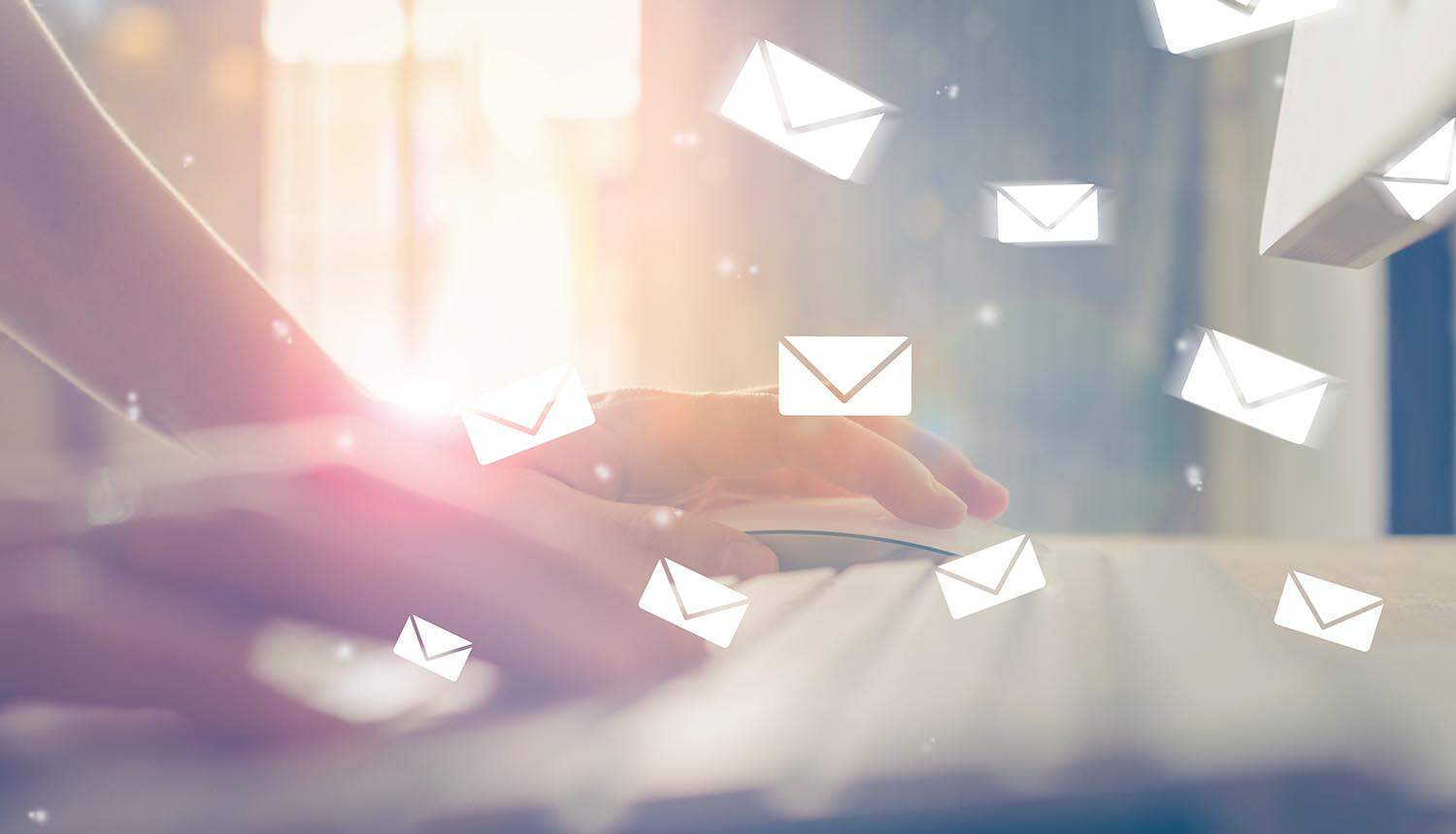 Envelopes around laptop showing private messages and training AI models