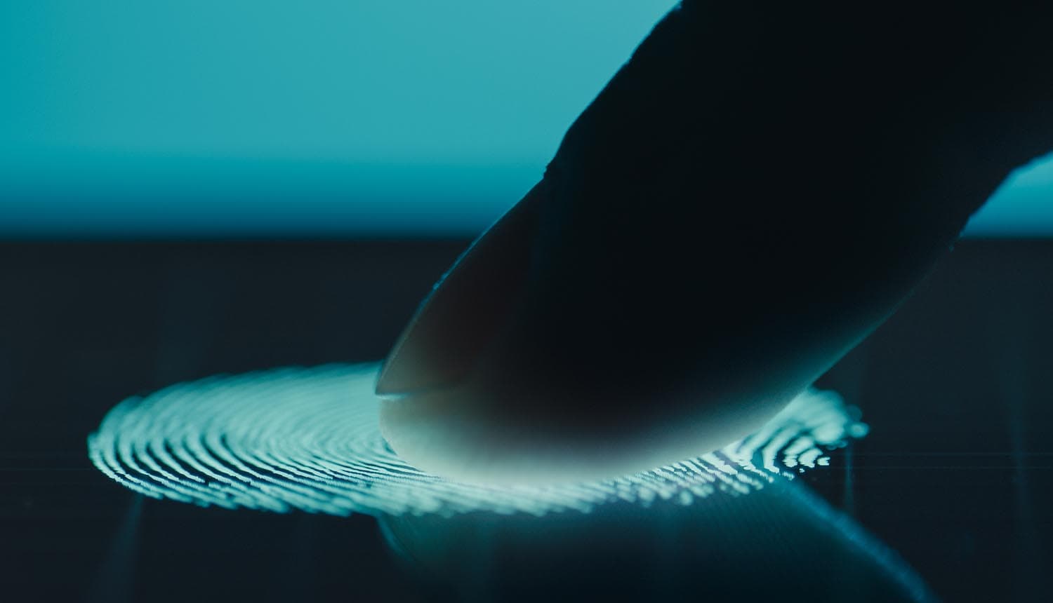 Fingerprint scan on device showing passwordless push by Microsoft