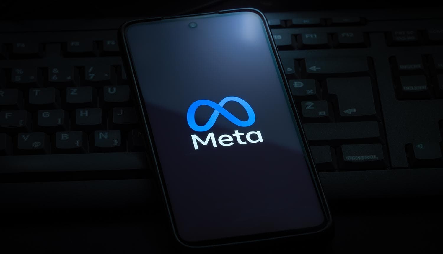 Meta logo on screen showing AI model exploit security vulnerability