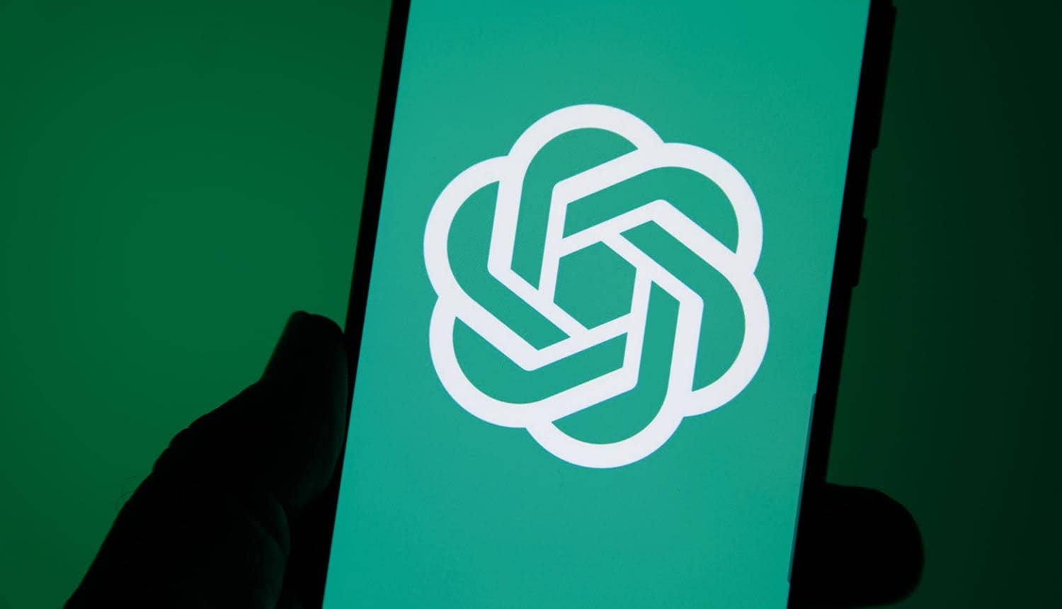 OpenAI logo on screen showing security safeguards for AI models