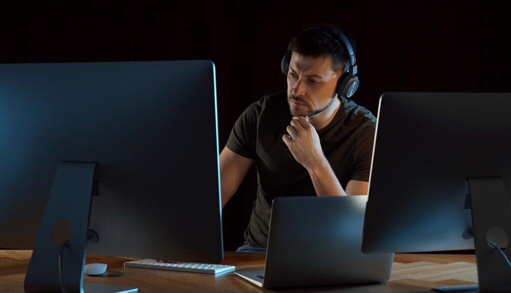 Hacker working in office showing cyber ops